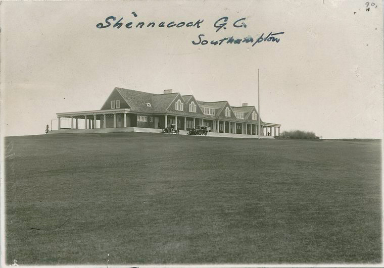 Early photograph inscribed “Shinnecock G.C. Southampton” showing the clubhouse on the hill with early automobiles parked outside