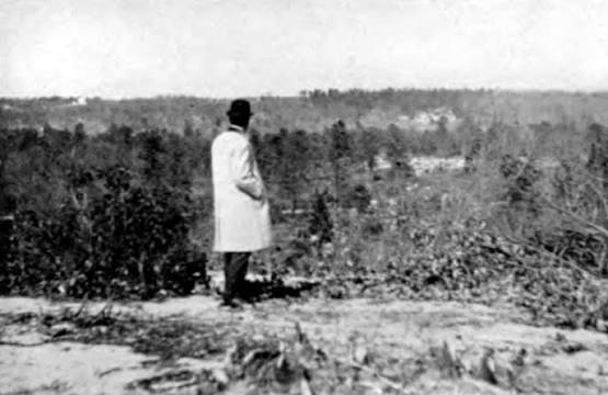 George Arthur Crump seated outdoors with Pine Valley's founding circle