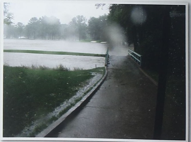 Floodwater covering a bridge and fairway at the second hole during the 2008 storm